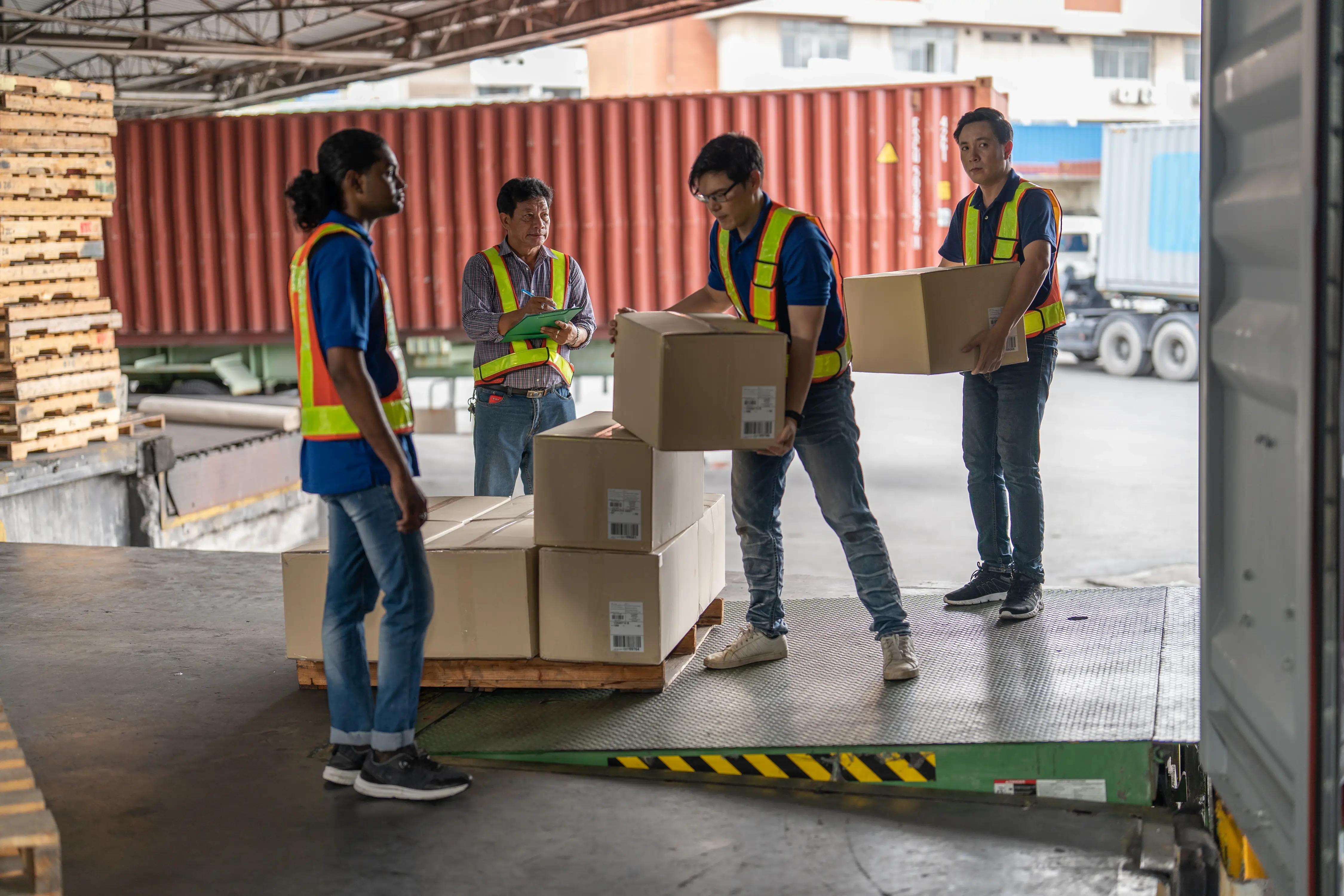 Warehouse team handling packages