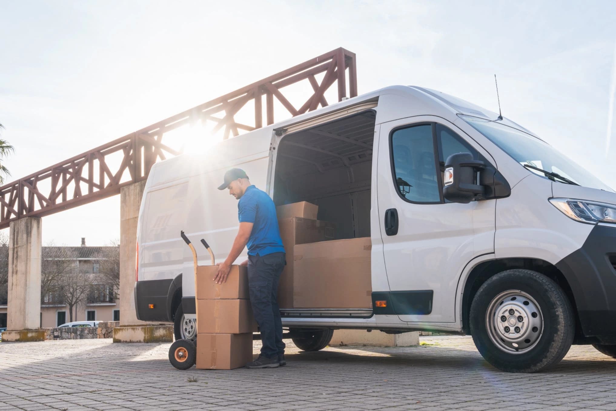 Worker loading delivery van