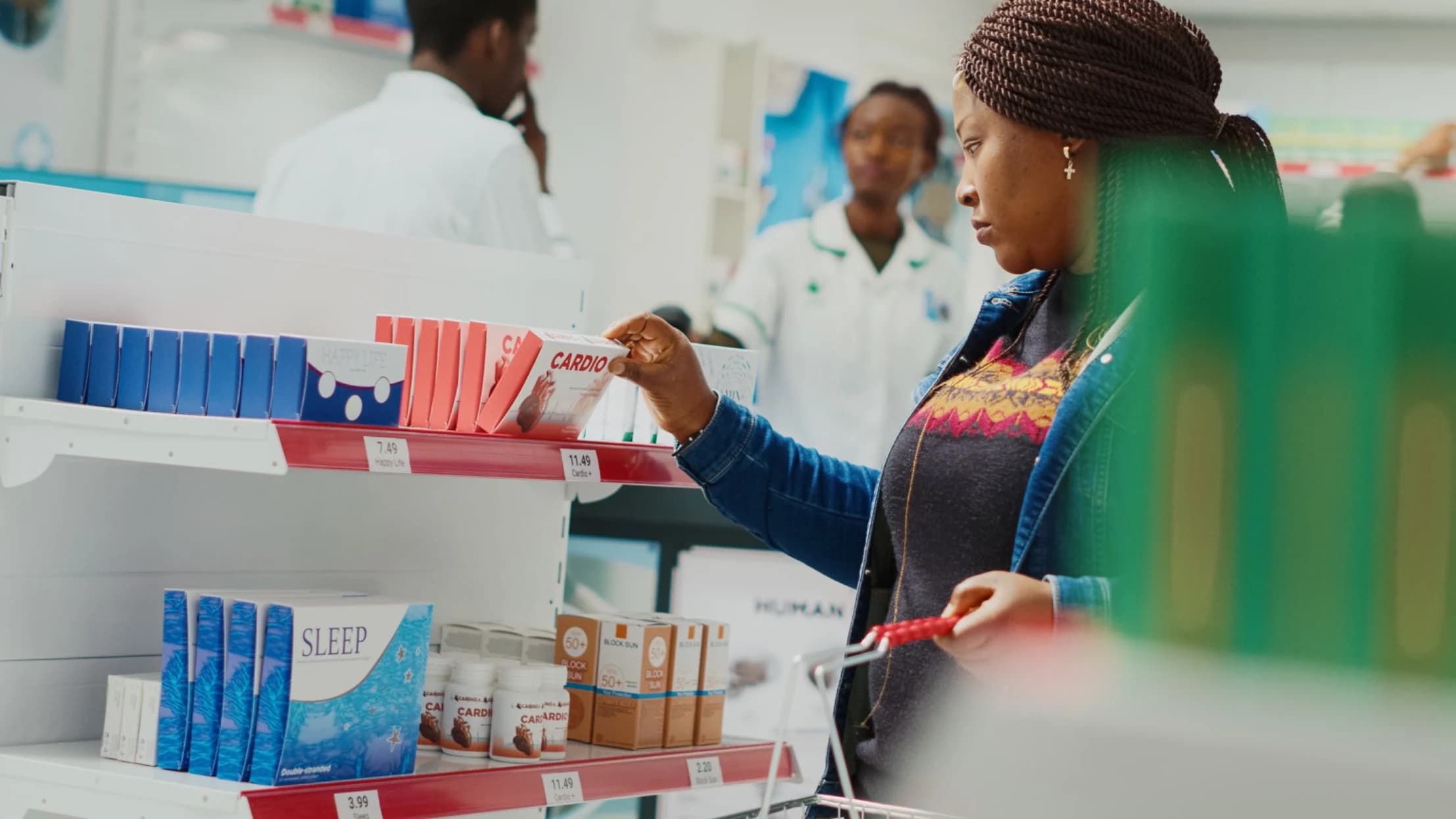 Pharmacist assisting customer with medication
